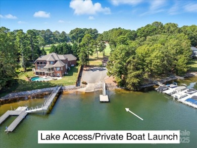 Experience a one-of-a-kind floor plan with this stunning on Cowans Ford Country Club in North Carolina - for sale on GolfHomes.com, golf home, golf lot