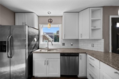 Welcome to this inviting home in the heart of Eden Prairie! on Bent Creek Golf Club in Minnesota - for sale on GolfHomes.com, golf home, golf lot