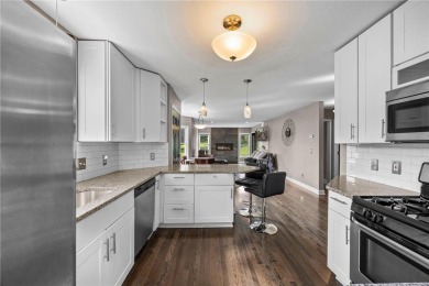 Welcome to this inviting home in the heart of Eden Prairie! on Bent Creek Golf Club in Minnesota - for sale on GolfHomes.com, golf home, golf lot
