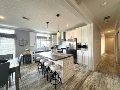 PRICED TO SELL! - This spectacular 1,456 plus plus square foot on The Meadows At Countrywood in Florida - for sale on GolfHomes.com, golf home, golf lot