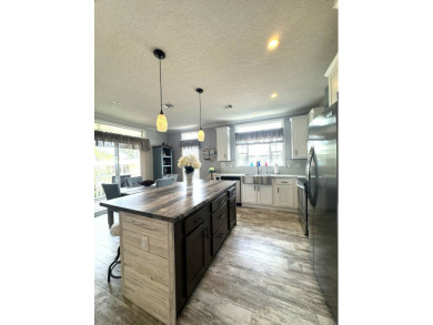 PRICED TO SELL! - This spectacular 1,456 plus plus square foot on The Meadows At Countrywood in Florida - for sale on GolfHomes.com, golf home, golf lot