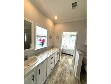 PRICED TO SELL! - This spectacular 1,456 plus plus square foot on The Meadows At Countrywood in Florida - for sale on GolfHomes.com, golf home, golf lot