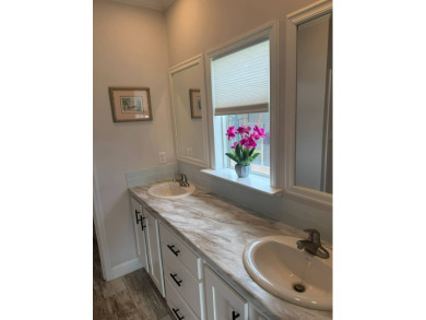 PRICED TO SELL! - This spectacular 1,456 plus plus square foot on The Meadows At Countrywood in Florida - for sale on GolfHomes.com, golf home, golf lot
