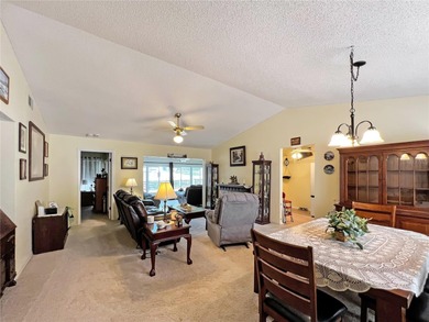 Welcome to easy Florida living in the sought-after golf on Heather Golf and Country Club in Florida - for sale on GolfHomes.com, golf home, golf lot