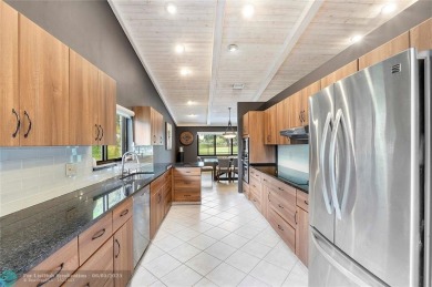 Move-In Ready Updated Immaculate 3-Bedroom, 2.5-Bath Pool Home on Woodmont Country Club in Florida - for sale on GolfHomes.com, golf home, golf lot