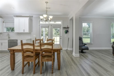 BETTER THAN NEW IN THE ESTATES OF SANCTUARY COVE.  SET ON OVER on The Golf Club At Sanctuary Cove in Georgia - for sale on GolfHomes.com, golf home, golf lot