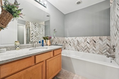 This beautifully maintained 2-bedroom, plus loft, 3.5-bath on Schaumburg Golf Club in Illinois - for sale on GolfHomes.com, golf home, golf lot
