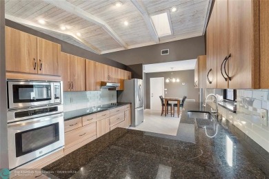 Move-In Ready Updated Immaculate 3-Bedroom, 2.5-Bath Pool Home on Woodmont Country Club in Florida - for sale on GolfHomes.com, golf home, golf lot