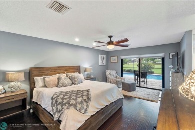 Move-In Ready Updated Immaculate 3-Bedroom, 2.5-Bath Pool Home on Woodmont Country Club in Florida - for sale on GolfHomes.com, golf home, golf lot