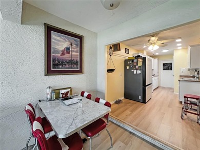 Welcome to easy Florida living in the sought-after golf on Heather Golf and Country Club in Florida - for sale on GolfHomes.com, golf home, golf lot