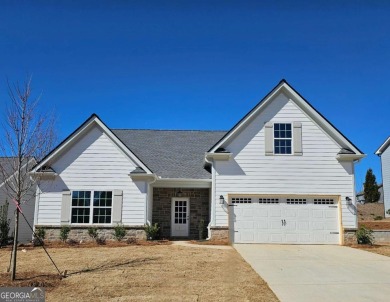 Hurry! This home will not last in the Traditions of Braselton on Traditions of Braselton Golf Club in Georgia - for sale on GolfHomes.com, golf home, golf lot