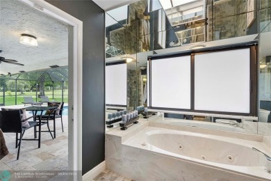 Move-In Ready Updated Immaculate 3-Bedroom, 2.5-Bath Pool Home on Woodmont Country Club in Florida - for sale on GolfHomes.com, golf home, golf lot
