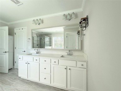 BETTER THAN NEW IN THE ESTATES OF SANCTUARY COVE.  SET ON OVER on The Golf Club At Sanctuary Cove in Georgia - for sale on GolfHomes.com, golf home, golf lot