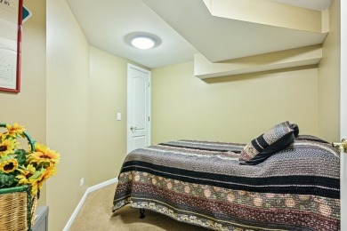 This beautifully maintained 2-bedroom, plus loft, 3.5-bath on Schaumburg Golf Club in Illinois - for sale on GolfHomes.com, golf home, golf lot