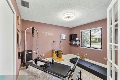 Move-In Ready Updated Immaculate 3-Bedroom, 2.5-Bath Pool Home on Woodmont Country Club in Florida - for sale on GolfHomes.com, golf home, golf lot