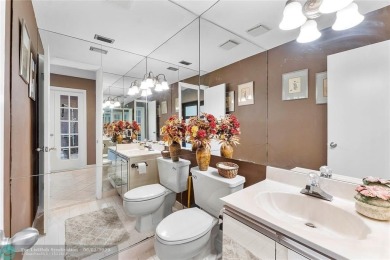 Move-In Ready Updated Immaculate 3-Bedroom, 2.5-Bath Pool Home on Woodmont Country Club in Florida - for sale on GolfHomes.com, golf home, golf lot
