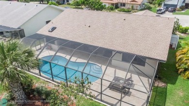 Move-In Ready Updated Immaculate 3-Bedroom, 2.5-Bath Pool Home on Woodmont Country Club in Florida - for sale on GolfHomes.com, golf home, golf lot