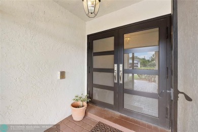 Move-In Ready Updated Immaculate 3-Bedroom, 2.5-Bath Pool Home on Woodmont Country Club in Florida - for sale on GolfHomes.com, golf home, golf lot