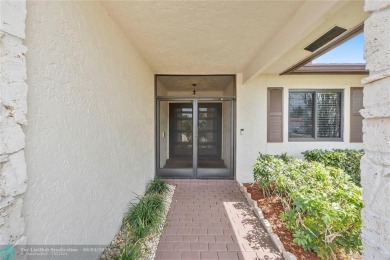 Move-In Ready Updated Immaculate 3-Bedroom, 2.5-Bath Pool Home on Woodmont Country Club in Florida - for sale on GolfHomes.com, golf home, golf lot