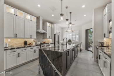 Discover this exquisitely remodeled 3-bedroom, 2-bathroom on Talon at Grayhawk Golf Course in Arizona - for sale on GolfHomes.com, golf home, golf lot