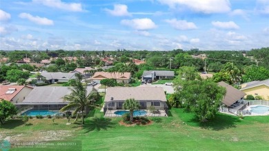 Move-In Ready Updated Immaculate 3-Bedroom, 2.5-Bath Pool Home on Woodmont Country Club in Florida - for sale on GolfHomes.com, golf home, golf lot