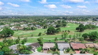 Move-In Ready Updated Immaculate 3-Bedroom, 2.5-Bath Pool Home on Woodmont Country Club in Florida - for sale on GolfHomes.com, golf home, golf lot