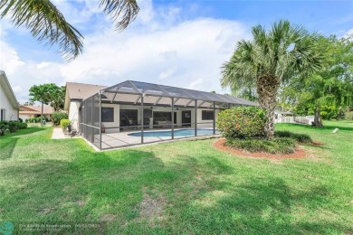 Move-In Ready Updated Immaculate 3-Bedroom, 2.5-Bath Pool Home on Woodmont Country Club in Florida - for sale on GolfHomes.com, golf home, golf lot