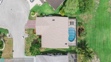 Move-In Ready Updated Immaculate 3-Bedroom, 2.5-Bath Pool Home on Woodmont Country Club in Florida - for sale on GolfHomes.com, golf home, golf lot
