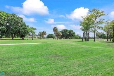 Move-In Ready Updated Immaculate 3-Bedroom, 2.5-Bath Pool Home on Woodmont Country Club in Florida - for sale on GolfHomes.com, golf home, golf lot