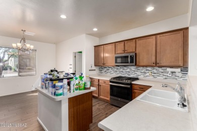 Welcome home! This beautiful 4-bedroom gem features a spacious on Del Lago Golf Club in Arizona - for sale on GolfHomes.com, golf home, golf lot