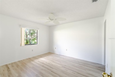 Charming 2-bed/2-bath Condo with Florida Room in Hudson! on Beacon Woods Golf Club in Florida - for sale on GolfHomes.com, golf home, golf lot