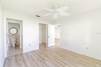 Charming 2-bed/2-bath Condo with Florida Room in Hudson! on Beacon Woods Golf Club in Florida - for sale on GolfHomes.com, golf home, golf lot