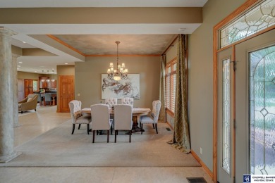 Indulge in luxury at this elegant ranch-style home in the on Wilderness Ridge Golf Club in Nebraska - for sale on GolfHomes.com, golf home, golf lot