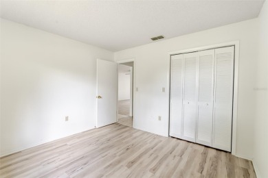 Charming 2-bed/2-bath Condo with Florida Room in Hudson! on Beacon Woods Golf Club in Florida - for sale on GolfHomes.com, golf home, golf lot