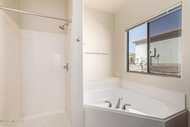 Welcome home! This beautiful 4-bedroom gem features a spacious on Del Lago Golf Club in Arizona - for sale on GolfHomes.com, golf home, golf lot
