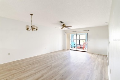 Charming 2-bed/2-bath Condo with Florida Room in Hudson! on Beacon Woods Golf Club in Florida - for sale on GolfHomes.com, golf home, golf lot