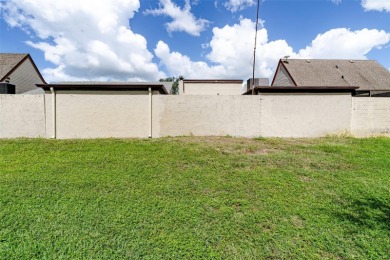 Charming 2-bed/2-bath Condo with Florida Room in Hudson! on Beacon Woods Golf Club in Florida - for sale on GolfHomes.com, golf home, golf lot