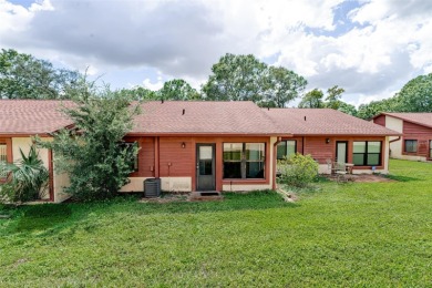 Charming 2-bed/2-bath Condo with Florida Room in Hudson! on Beacon Woods Golf Club in Florida - for sale on GolfHomes.com, golf home, golf lot
