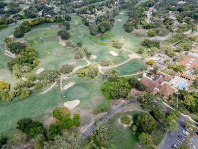 Charming 2-bed/2-bath Condo with Florida Room in Hudson! on Beacon Woods Golf Club in Florida - for sale on GolfHomes.com, golf home, golf lot