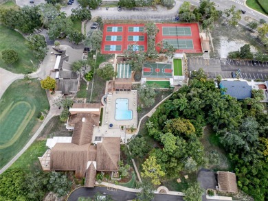 Charming 2-bed/2-bath Condo with Florida Room in Hudson! on Beacon Woods Golf Club in Florida - for sale on GolfHomes.com, golf home, golf lot