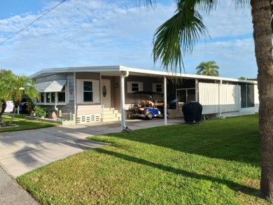 WELCOME TO YOUR NEW FLORIDA HOME WITH CARE-FREE LIVING!  This on Grasslands Golf and Country Club in Florida - for sale on GolfHomes.com, golf home, golf lot