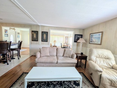WELCOME TO YOUR NEW FLORIDA HOME WITH CARE-FREE LIVING!  This on Grasslands Golf and Country Club in Florida - for sale on GolfHomes.com, golf home, golf lot