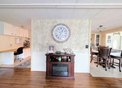 WELCOME TO YOUR NEW FLORIDA HOME WITH CARE-FREE LIVING!  This on Grasslands Golf and Country Club in Florida - for sale on GolfHomes.com, golf home, golf lot
