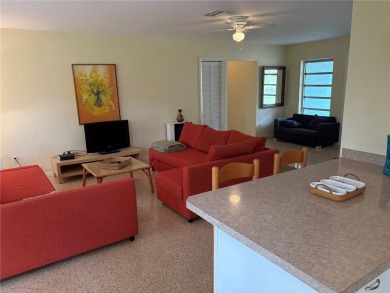 Welcome to this spacious move in ready home in one of the best on The Dunedin Country Club in Florida - for sale on GolfHomes.com, golf home, golf lot