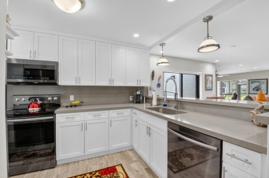 A picture says 1000 words. Elegantly renovated end unit with on Boca Lago Golf and Country Club in Florida - for sale on GolfHomes.com, golf home, golf lot