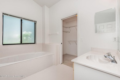 Exceptional move in ready three-bedroom home located in a on Indian River Colony Club in Florida - for sale on GolfHomes.com, golf home, golf lot