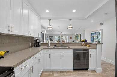 A picture says 1000 words. Elegantly renovated end unit with on Boca Lago Golf and Country Club in Florida - for sale on GolfHomes.com, golf home, golf lot