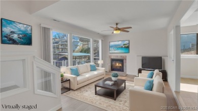 Discover this waterfront retreat at the 2-mile marker here in on Seasons Ridge At Four Seasons in Missouri - for sale on GolfHomes.com, golf home, golf lot