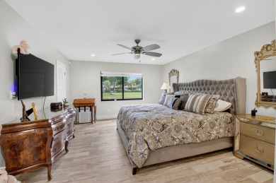 A picture says 1000 words. Elegantly renovated end unit with on Boca Lago Golf and Country Club in Florida - for sale on GolfHomes.com, golf home, golf lot