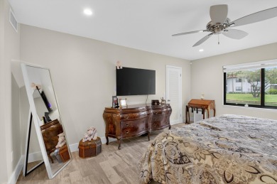 A picture says 1000 words. Elegantly renovated end unit with on Boca Lago Golf and Country Club in Florida - for sale on GolfHomes.com, golf home, golf lot